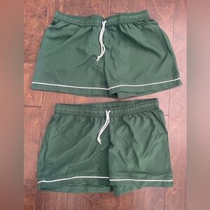 Two pairs of green PJ shorts